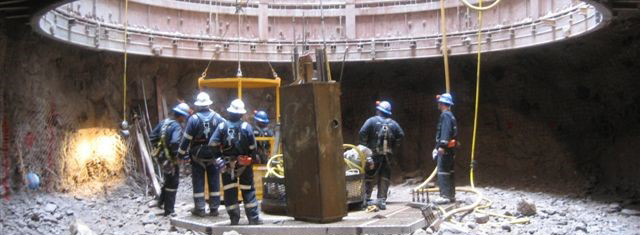 Six miners in a hot underground environment